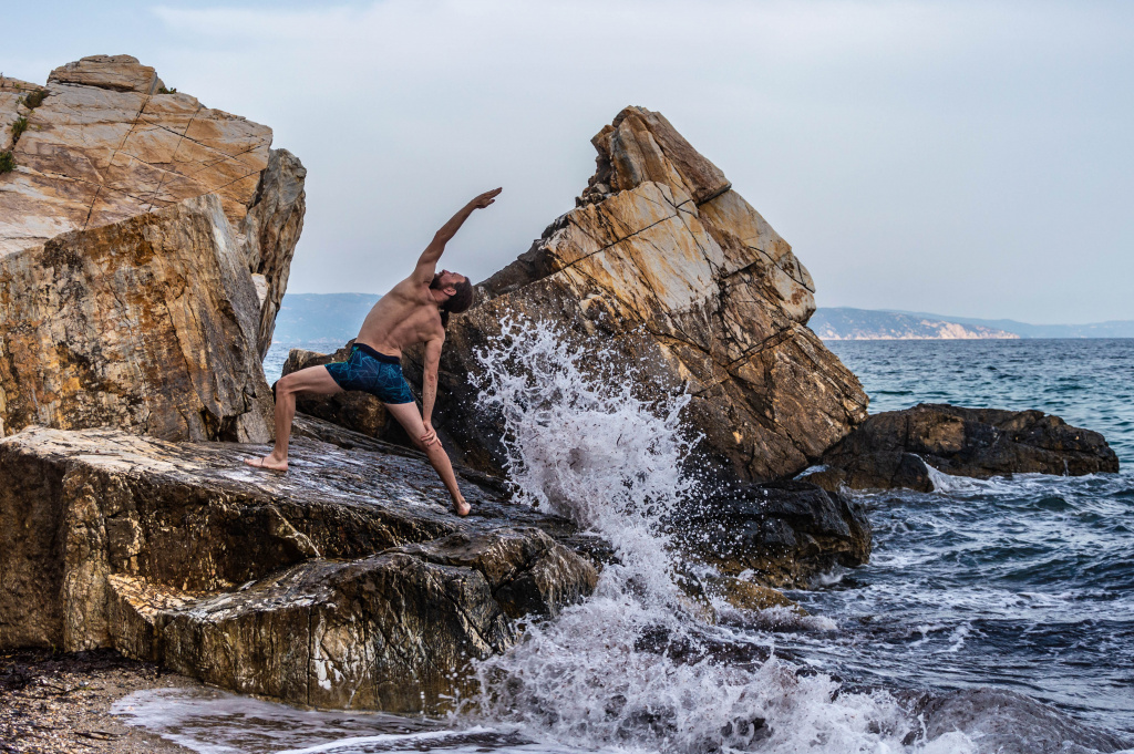 Angelos doing viparita virabhadrasana